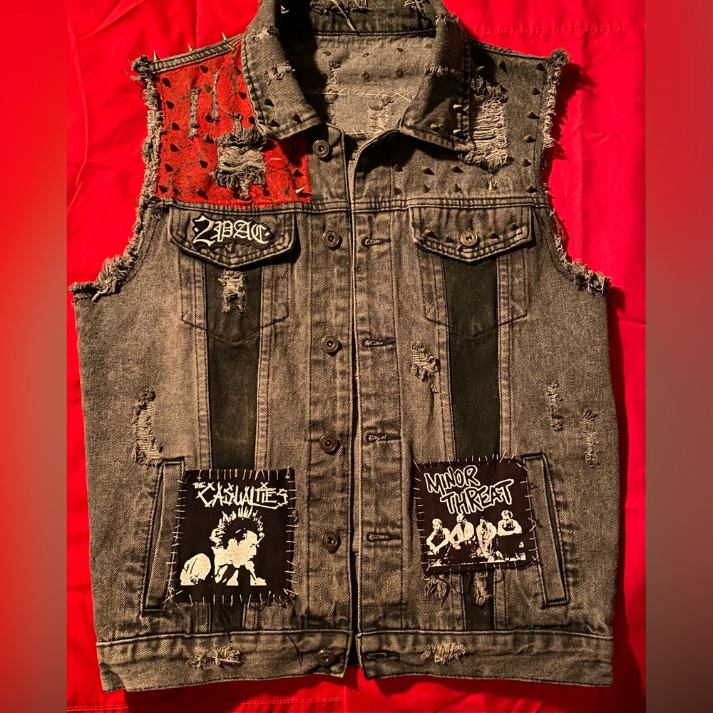 One of a kind punk style vest -up and coming artist